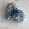Celestite crystal on a marble surface